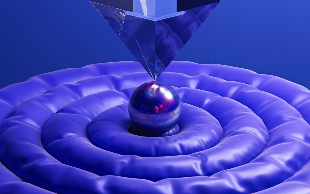 A blue abstract design with a pyramid.